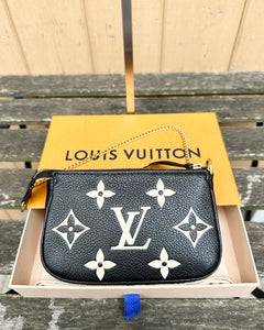 LOUIS VUITTON Bicolour Monogram Empreinte Leather Mini Pochette