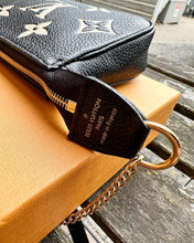 Load image into Gallery viewer, LOUIS VUITTON Bicolour Monogram Empreinte Leather Mini Pochette
