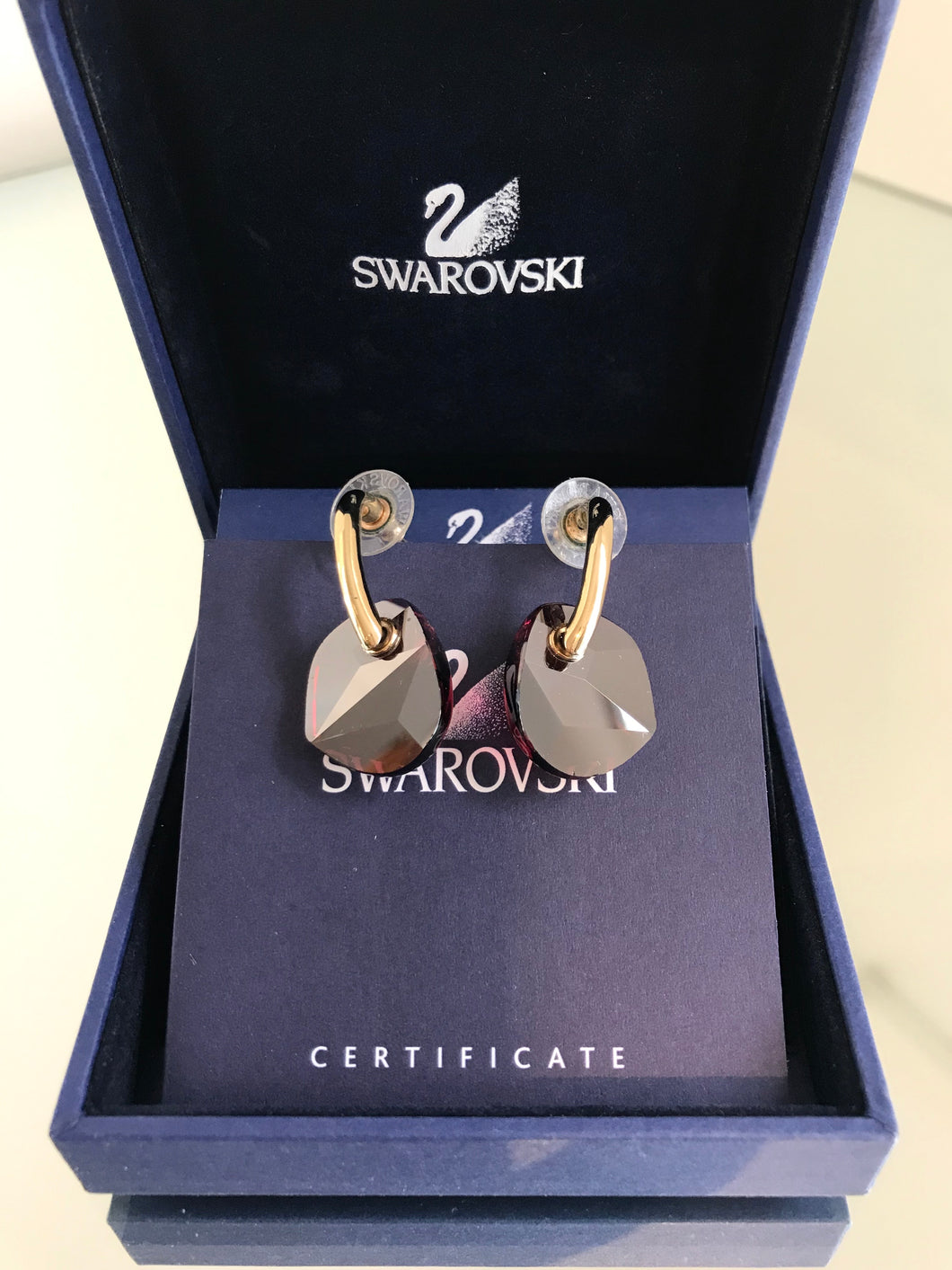 SWAROVSKI Red Pierced Earrings